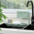 Adjustable kitchen sink organizer for sponges and scrubbers