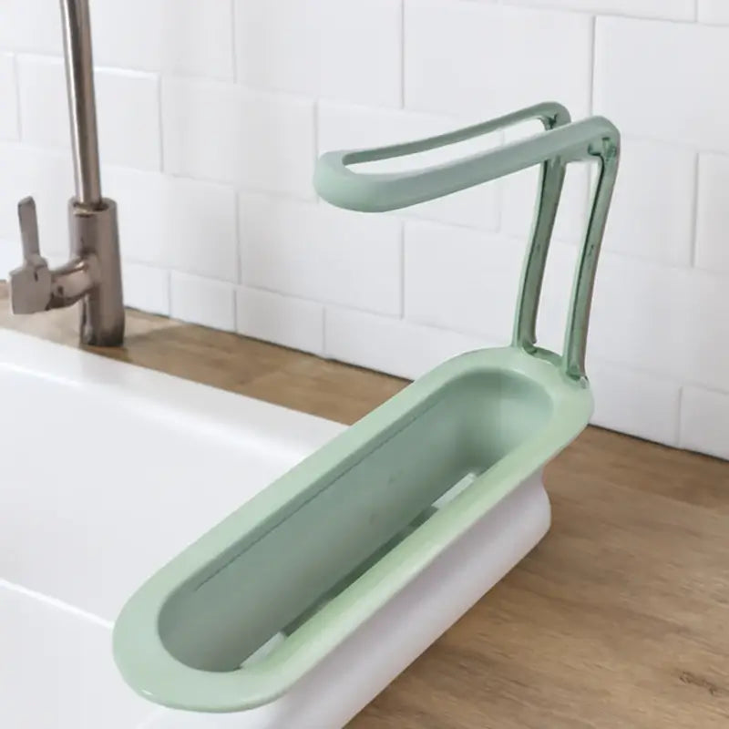 Modern kitchen sink organizer with adjustable holder
